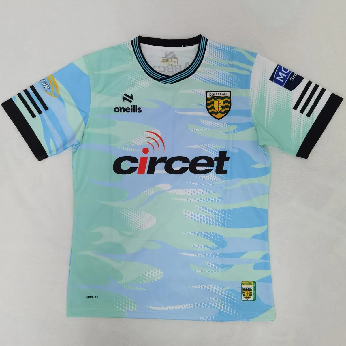 Donegal GAA Training Jersey in mint, sky blue, black