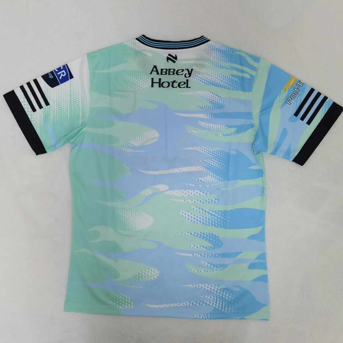 Donegal GAA Training Jersey in mint, sky blue, black view 2