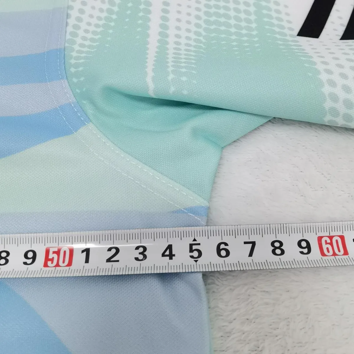 Donegal GAA Training Jersey in mint, sky blue, black view 3