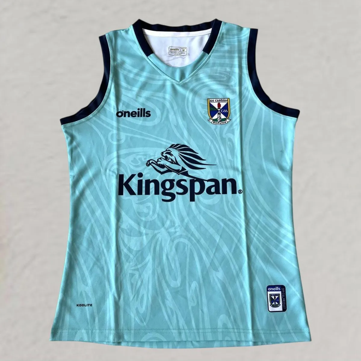 Cavan GAA Training Vest in teal, navy