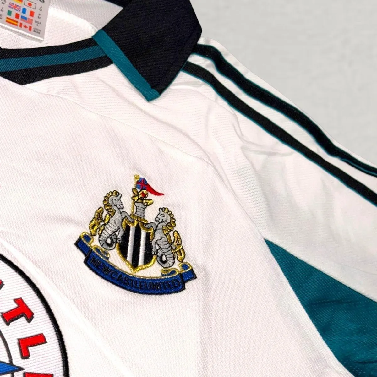 Newcastle United 1999-00 Away Shirt in white, teal, black view 3